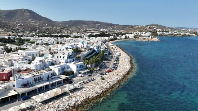 Aerial drone video of traditional settlement of Paroikia with unique Cycladic architecture, Paros island, Cyclades, Greece