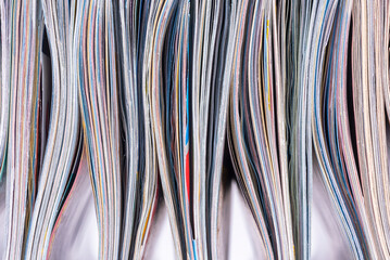 Old colored paper magazines, top view