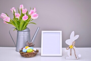 Easter composition with tulips and bunny.