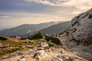 A route to Kazana shelter against Todorka peak in summer day. Pirin highlands near Vihren and Kutelo peaks in Pirin national park, Bulgaria.