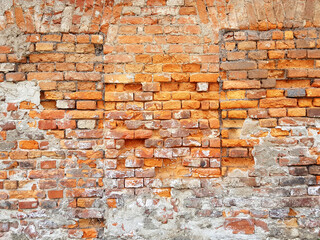 Damaged red brick wall texture background.