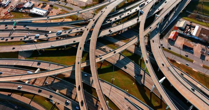 Web of highways and freeways with lively traffic on. Roads of Dallas, Texas, USA from top view.