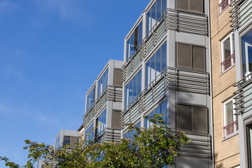Fototapeta premium Facade of a modern residential building. Real estate investment. Expensive housing.