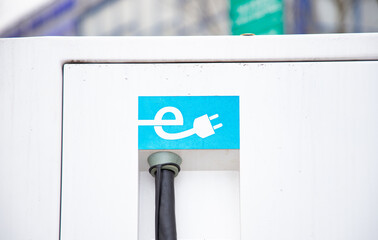 charging an electric car on the street