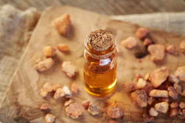 A bottle of aromatherapy essential oil with styrax benzoin resin