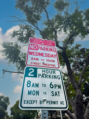 No parking except by permit sign