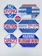 Pool rule signs on a wall - 728871899
