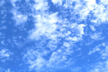 Naklejka na ściany i meble blue-sky abstract with some clouds on summer day .Blue and white cloudscape. Nature beauty. awesome afternoon view