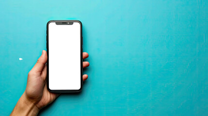 Person Holding a SmartPhone on blue background with copy space 