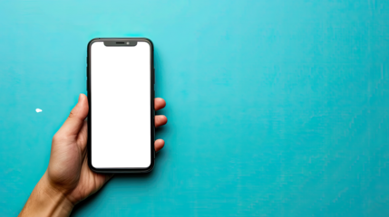 Person Holding a SmartPhone on blue background with copy space 