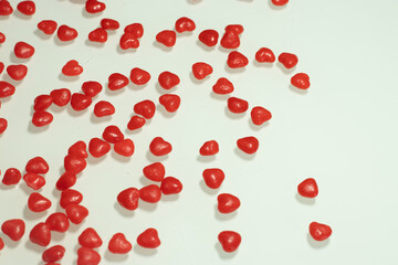 several litlle hearts on the white table
