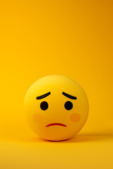 Sad emoji on a yellow background