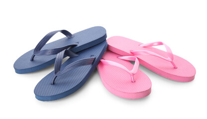 Colorful pairs of female flip flops on white background