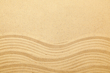 Closeup view of sand texture with lines. Zen concept