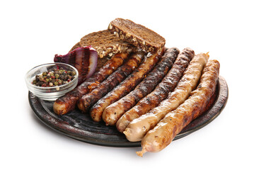 Plate with tasty grilled sausages, peppercorn, bread and onion on white background