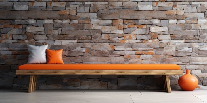 Contemporary interior design with a stone wall, wooden bench, and orange elements.
