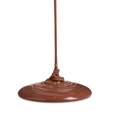 Pouring tasty melted milk chocolate isolated on white