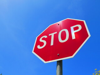 Stop Sign on Blue Sky