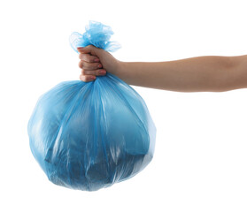 Woman holding plastic bag full of garbage on white background, closeup