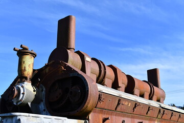 Air system on old locomotive engine.