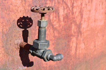 Ninety degree fitting on drain valve.