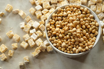 soybeans and diced tempeh. Tempeh or tempe is a superfood made from fermented soybeans. Indonesian food. protein.