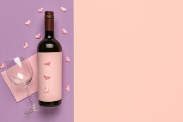 Composition with bottle of wine, envelope and glass for Valentine's day on lilac background