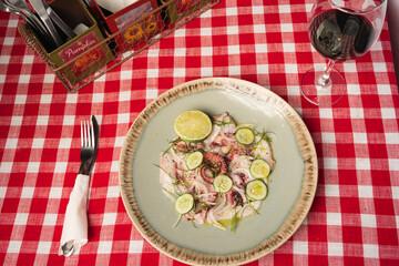 Italian dish with octopus, cucumber and lemon