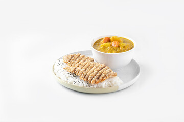 Pork  in curry sauce and rice on white backgrounds 