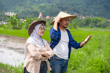 man farmers give directions to his junior. couple concept. agriculture couple concept.