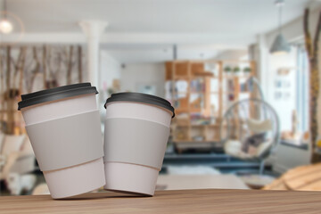 two empty white coffee cups on a 3D rendering wooden table with a blurry cafe background