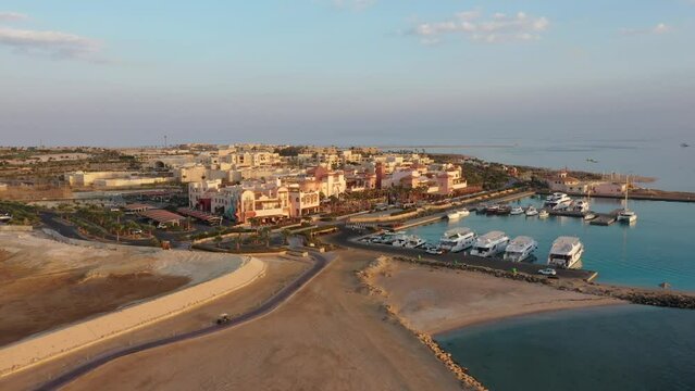 Low Flying Aerial Drone shot of Somabay Marina at Sunset
