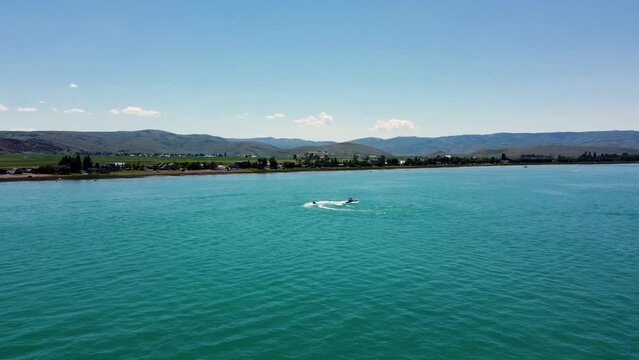 Aerial 4k view of Boating at Bear Lake Utah 