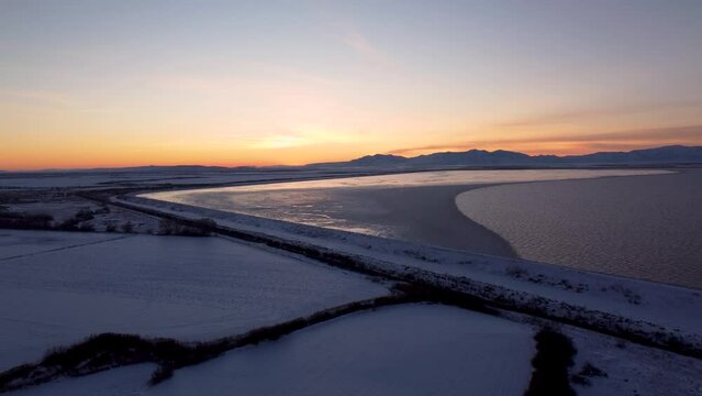 4k Aerial Drone Snow-Capped Mountains Overlooking Willard Bay, Utah