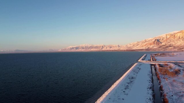 4k Aerial Drone Snow-Capped Mountains Overlooking Willard Bay, Utah