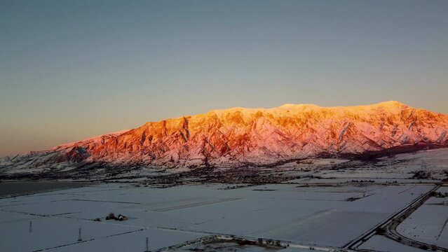 4k Aerial Drone Snow-Capped Mountains Overlooking Willard Bay, Utah