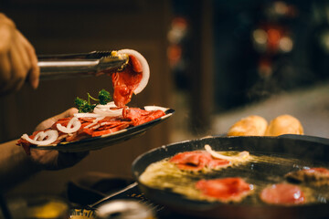 put meat on the grill