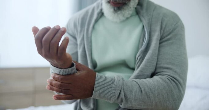 Hands, wrist pain and old man with arthritis, health and carpal tunnel, joint ache and massage muscle. Tension, pressure and inflammation with fibromyalgia, injury or accident with rheumatism
