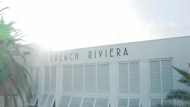 Profile view of French Riviera building with sun shining at background in south of France during daytime. Aerial Shot.