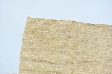 torn sackcloth isolated on white background, burlap fabric texture for design