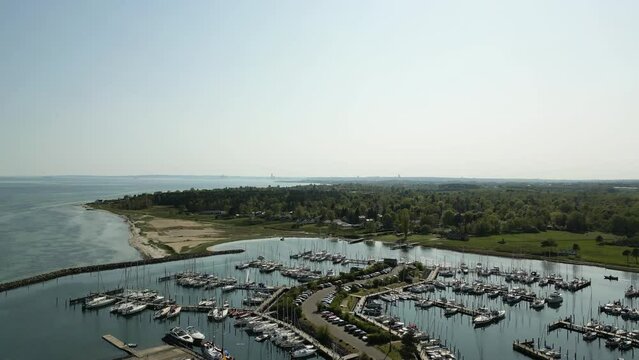 Drone footage of Ege Marina, Kal&oslash;vig boat guild. The drone flies over the marina, showing its extent.