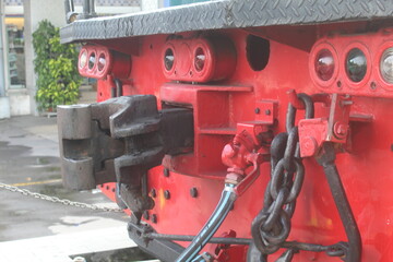 Close up of old steam locomotive in dull red color. suitable for locomotive and industrial concept.