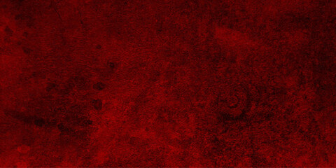 Dark red abstract surface grunge wall.noisy surface concrete texture.panorama of,decorative plaster aquarelle stains.background painted iron rust,dust texture paint stains.
