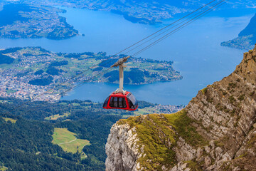 Overhead cable car to the top of Mount Pilatus in Canton Lucerne, Switzerland © olyasolodenko
