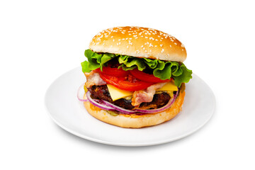 Burger, hamburger with meat cutlet, bacon, cheese, tomato and lettuce on a plate. Isolated.