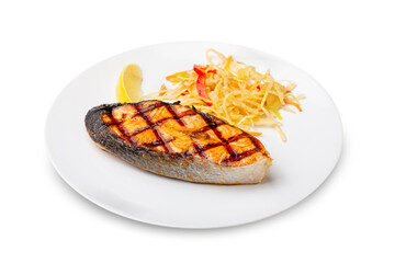 Grilled salmon steak with lemon. Isolated.
