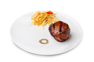 Filet mignon steak in a plate. Isolated.