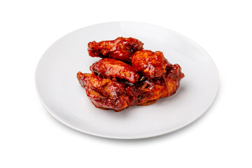 Chicken BBQ wings in a plate. Isolated.