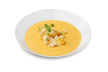 Cream of mushroom soup in a plate. Isolated.