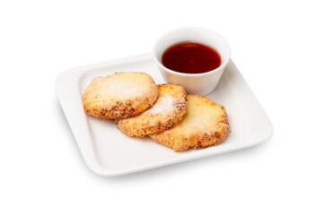 Cheesecakes with jam in a plate. Isolated.